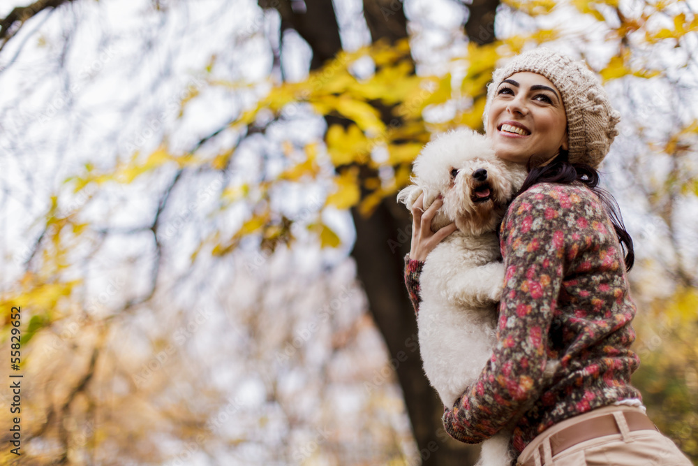 Young woman with a cute dog Young woman with a cute dog