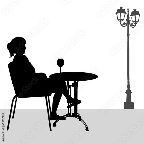 Silhouette of girl in cafe