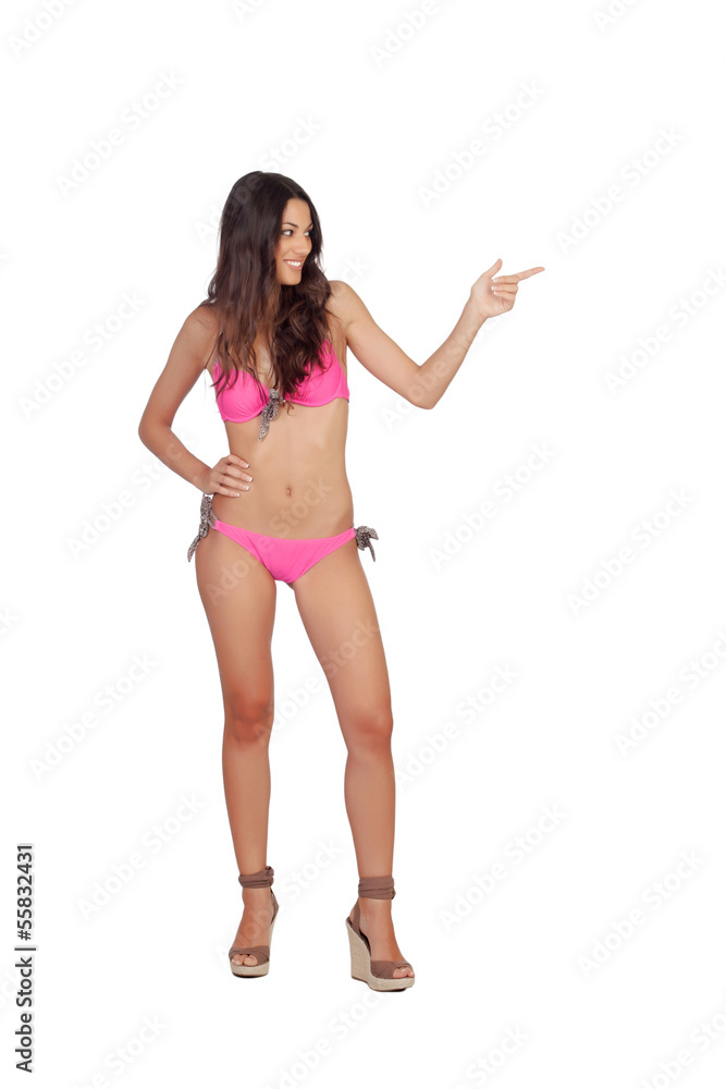 Attractive woman with pink swimwear indicating something Attractive woman with pink swimwear indicating something