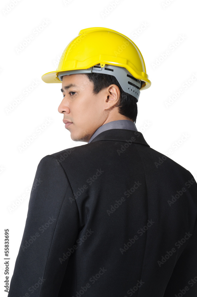 young foreman or engineer with yellow hard hat in suit isolated young foreman or engineer with yellow hard hat in suit isolated