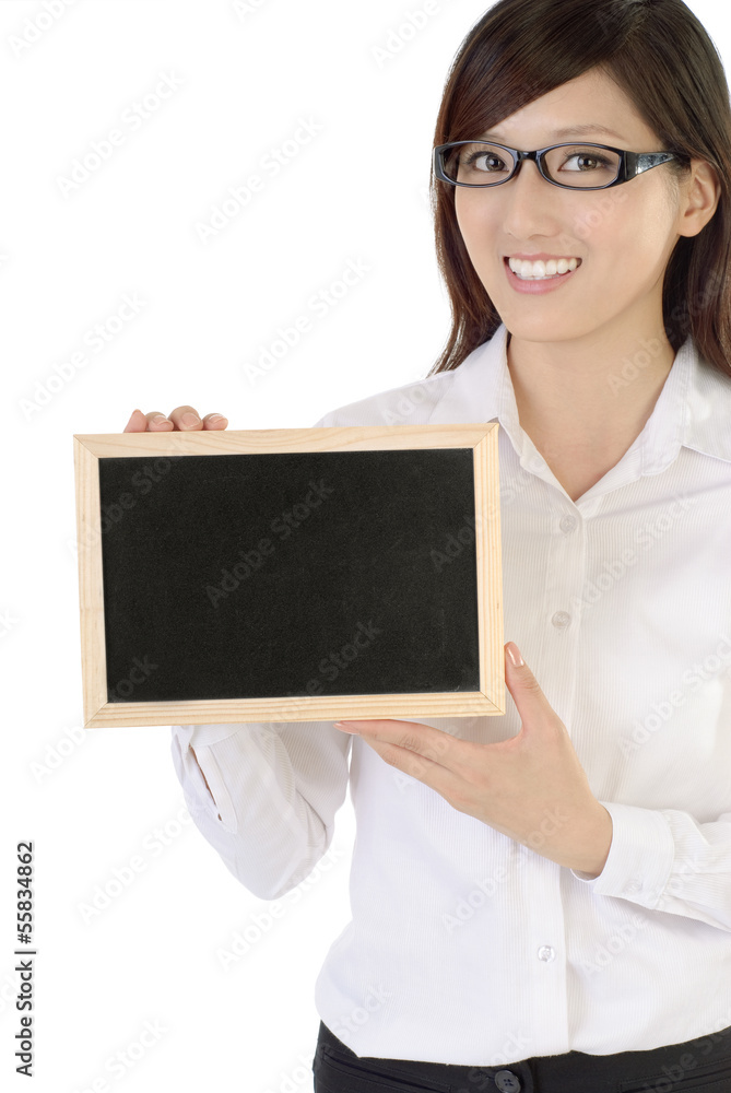 Businesswoman holding blackboard Businesswoman holding blackboard