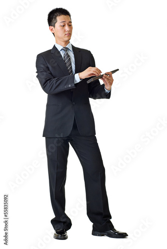 Young businessman with calculator