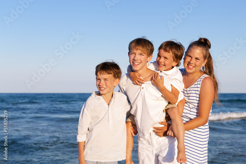 Children are standing on beach © rimmdream