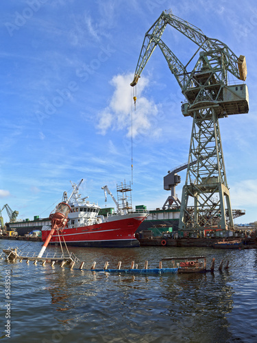 Industrial zone - Big crane on Shipyard Gdansk, Poland.