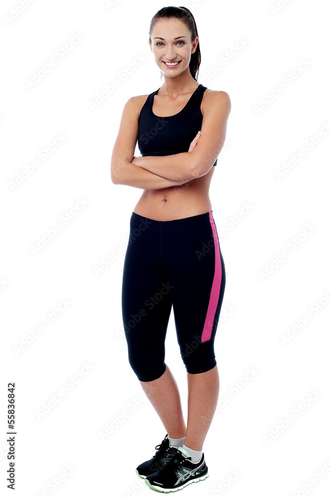 Confident young fit woman, arms crossed Confident young fit woman, arms crossed