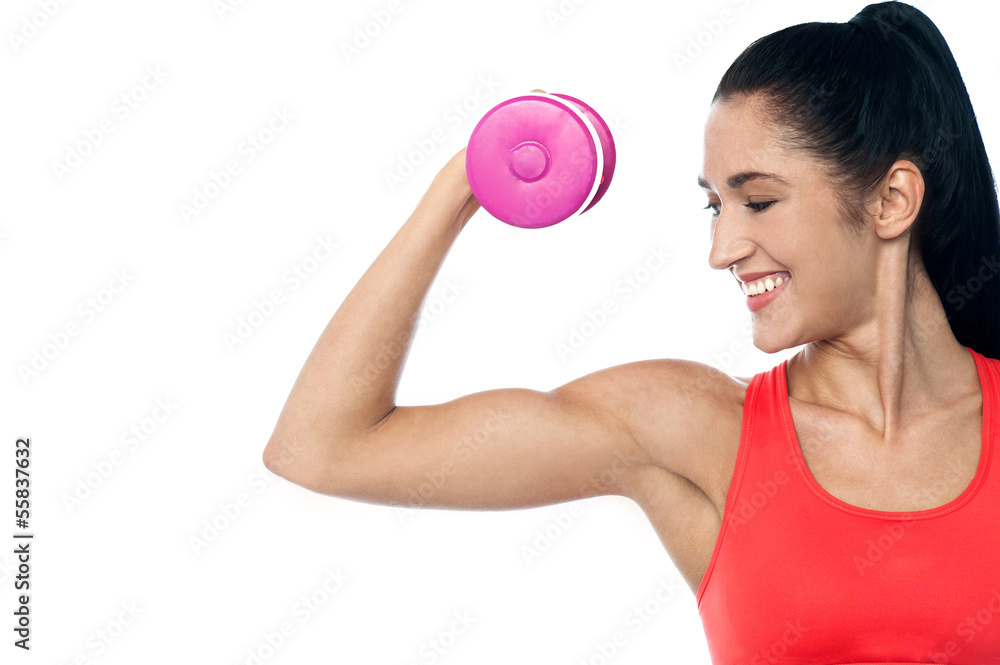Pretty woman working out with dumbbell Pretty woman working out with dumbbell