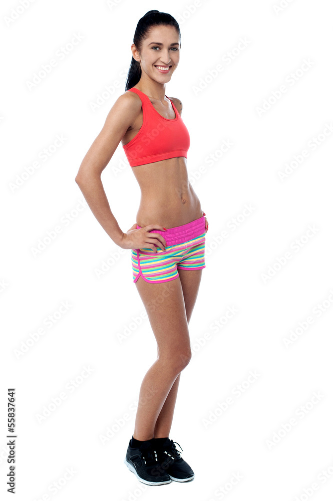 Slim athletic smiling girl, full length portrait Slim athletic smiling girl, full length portrait
