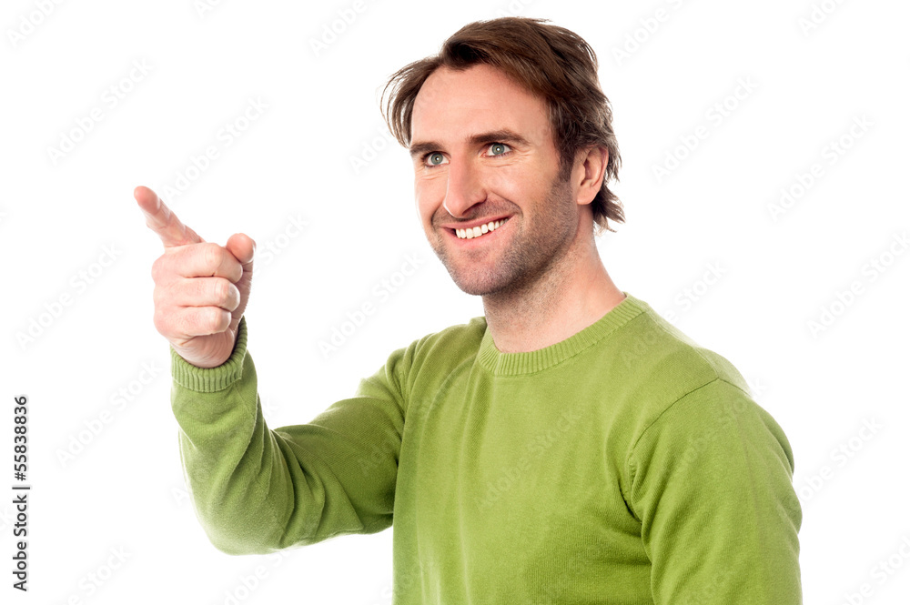 Casual man pointing at something Casual man pointing at something