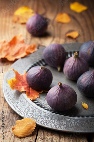fresh figs and autumn leaves