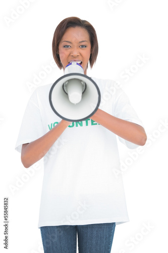 Volunteer woman shouting in megaphone