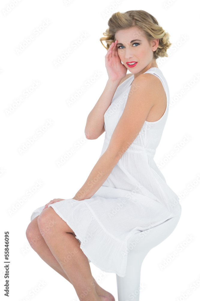 Lovely fashion blonde model posing looking at camera Lovely fashion blonde model posing looking at camera