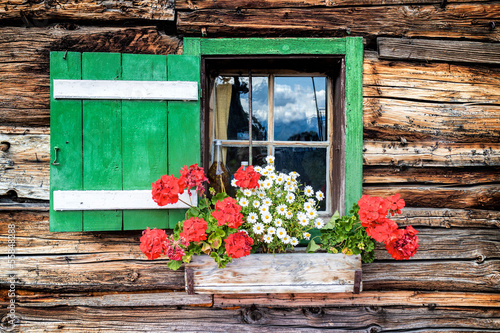 Window of an old wooden cabin #55848288