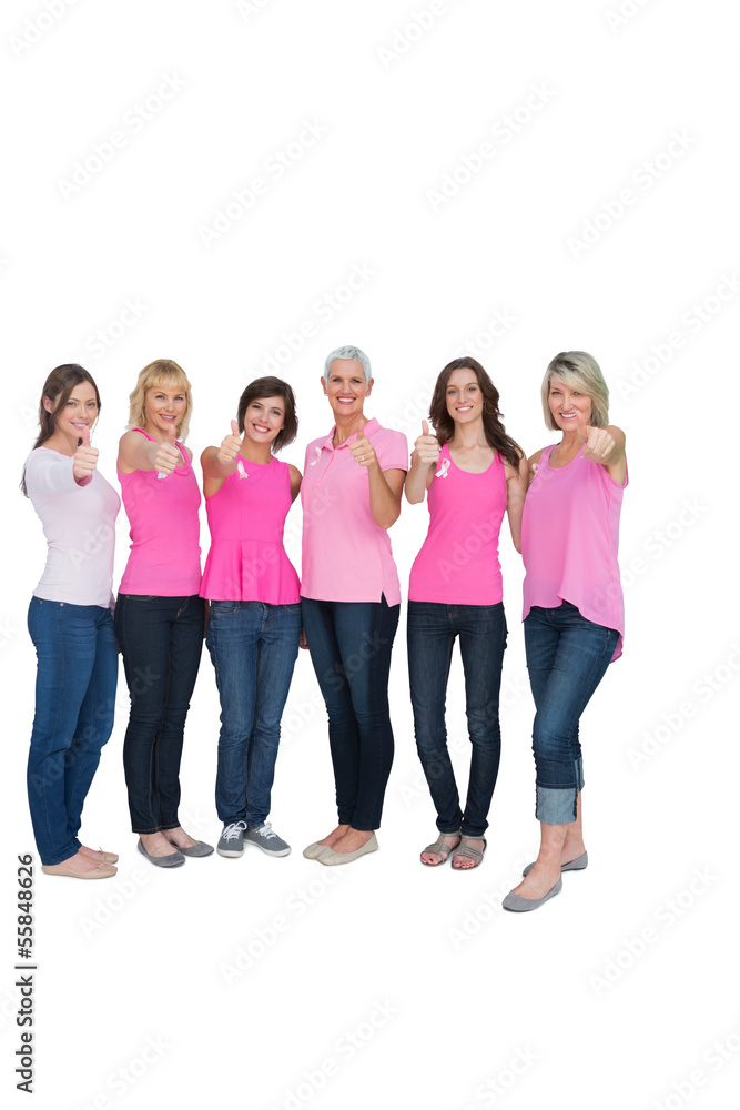 Positive women posing with pink top for breast cancer Positive women posing with pink top for breast cancer