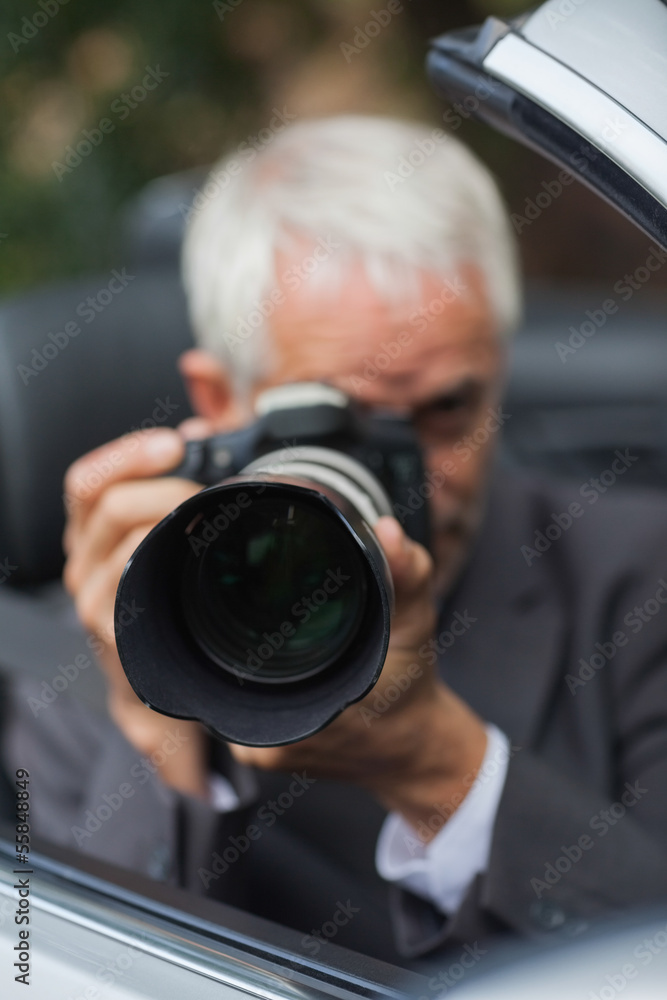Mature paparazzi taking picture Mature paparazzi taking picture