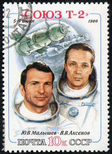 stamp shows Soviet cosmonauts Malyshev and Aksenov photo