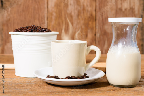 coffee cup and coffee beans and milk