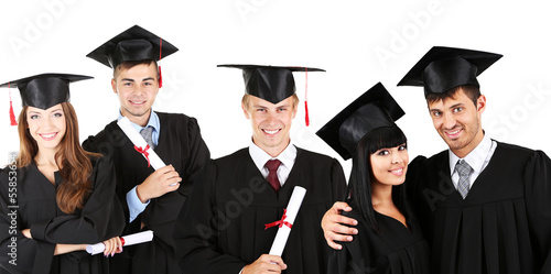 Young graduates isolated on white