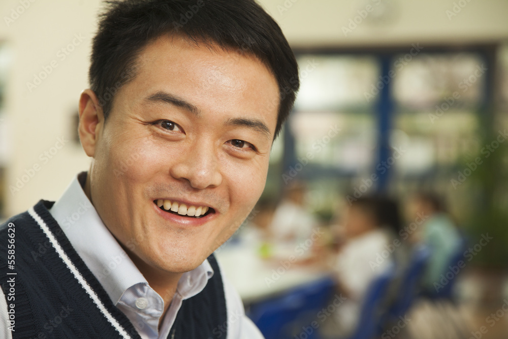 Teacher portrait at lunch in school cafeteria Teacher portrait at lunch in school cafeteria