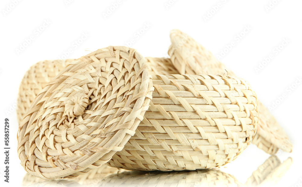 Two wicker baskets with covers, isolated on white