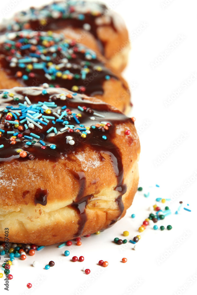 Tasty donuts with chocolate, isolated on white Tasty donuts with chocolate, isolated on white