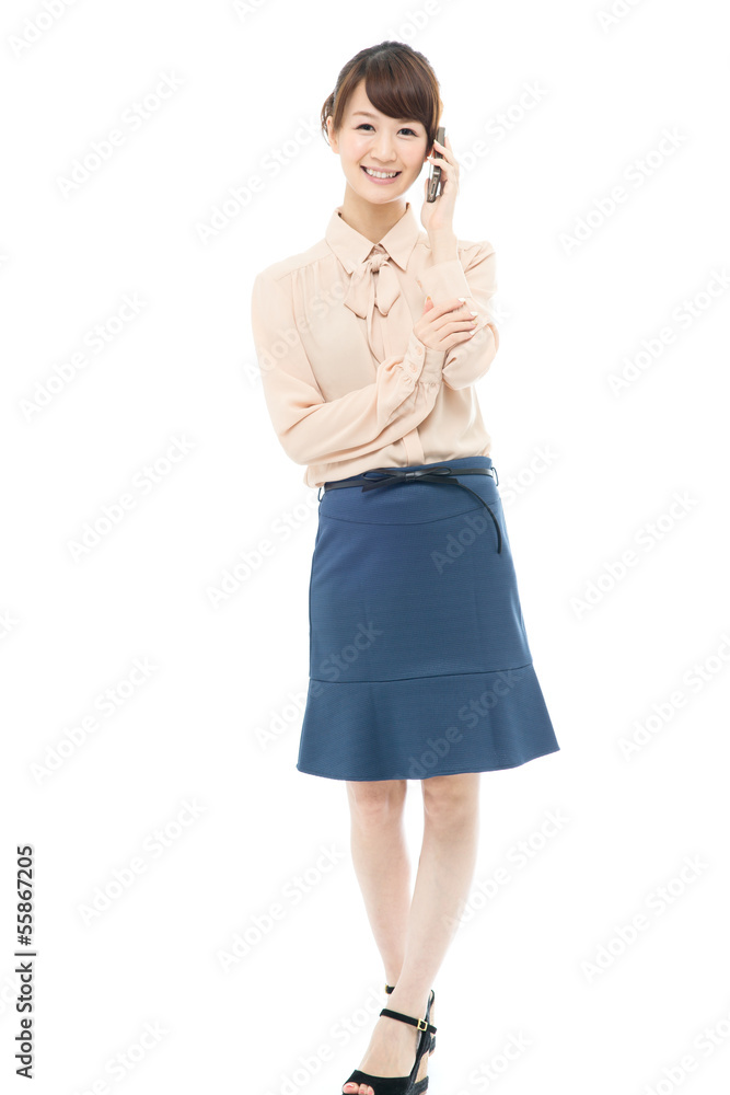 Beautiful asian business woman using a cellular Beautiful asian business woman using a cellular