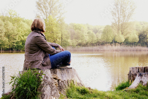 young woman at lake