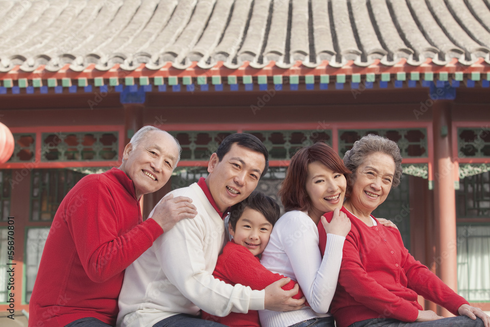 Fototapeta premium Multi-generation Family in Traditional Chinese Courtyard