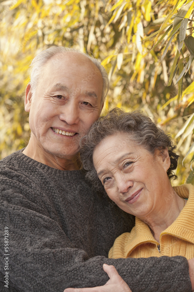 Portrait of senior couple under trees, Beijing Portrait of senior couple under trees, Beijing
