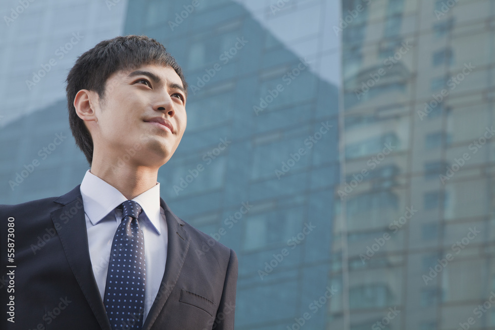 Young Businessman Looking Up, Glass Building, Portrait Young Businessman Looking Up, Glass Building, Portrait