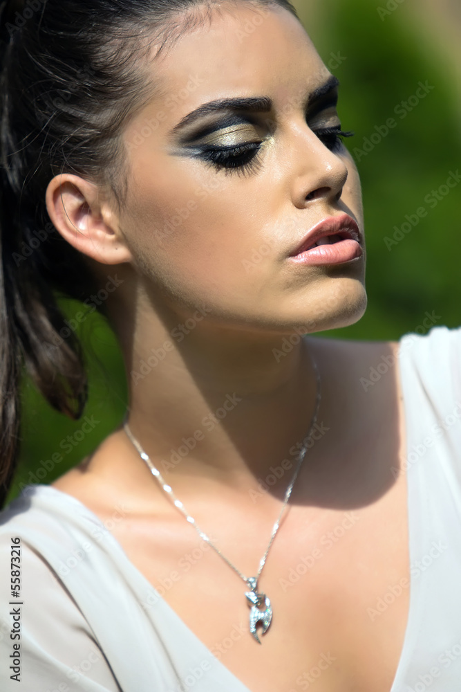 Beautiful female face with fashion make-up