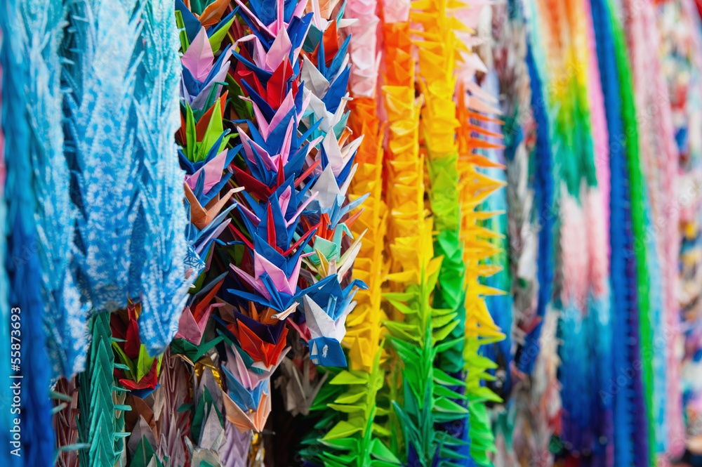 Close up of colorful origami offerings