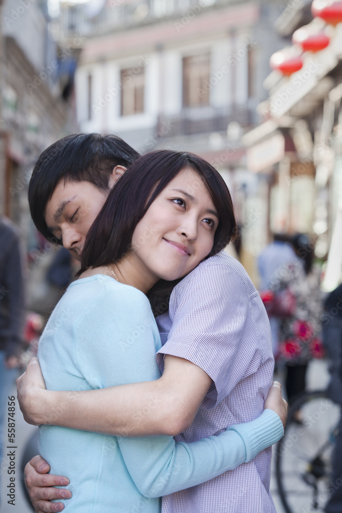 Young Couple Hugging in HouHai Area Young Couple Hugging in HouHai Area