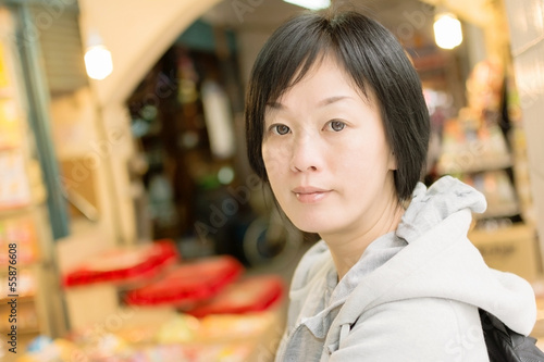 Mature Asian women at street