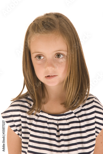 young girl with big eyes in black and white striped shirt with s