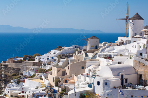 The Windmill in Oia and the Aegean Sea in Greece