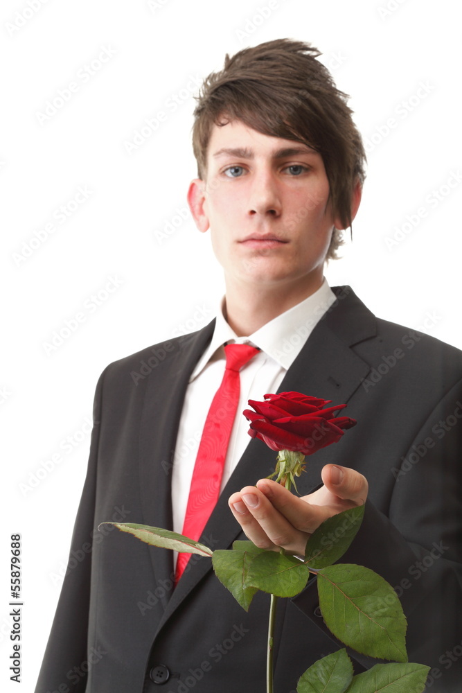 Young man presenting a flower red rose isolated Young man presenting a flower red rose isolated