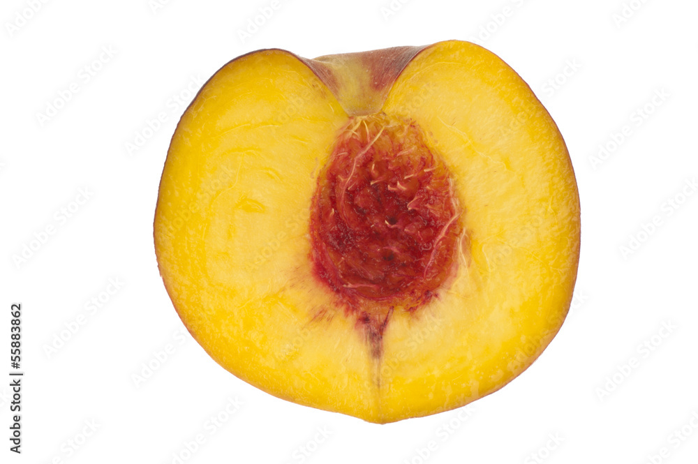 Peach cut through and isolated in white Peach cut through and isolated in white