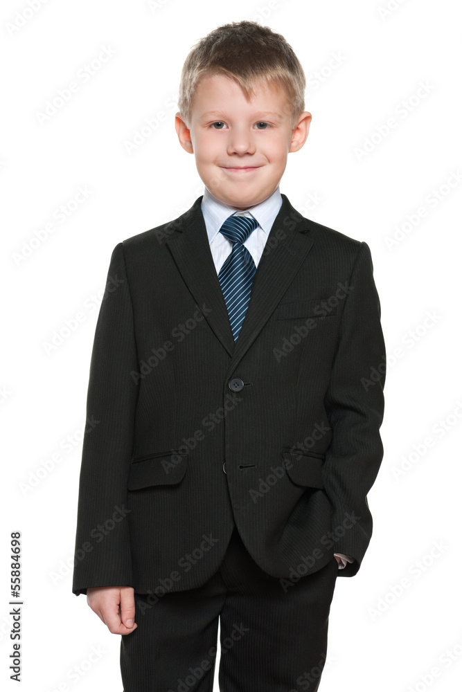 Handsome smiling young boy in black suit Handsome smiling young boy in black suit