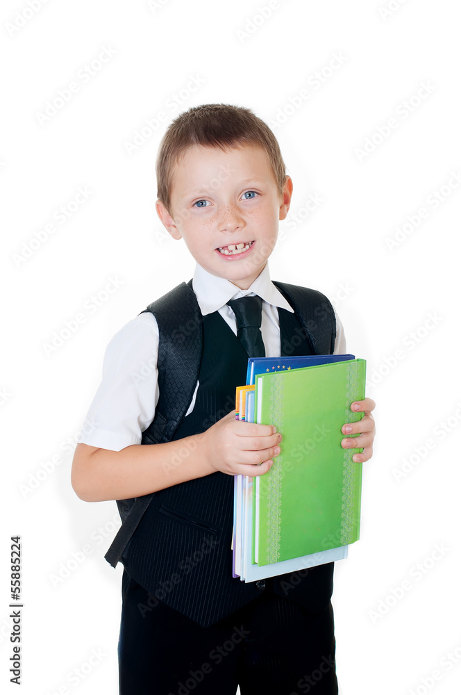 Little boy with a school backpack and books Little boy with a school backpack and books