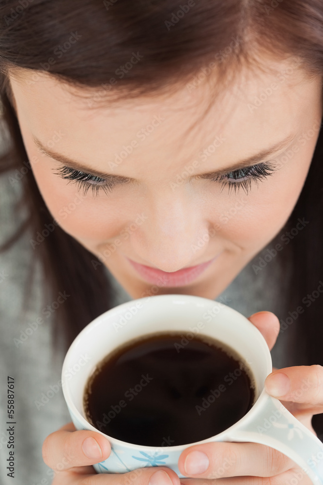 Girl drinking a cup of coffee Girl drinking a cup of coffee
