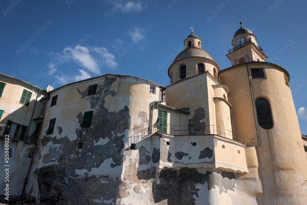 Fototapeta premium Ancient Italian church agaist blue sky