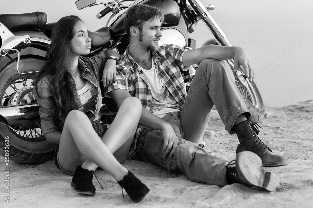 Fototapeta premium Happy young love couple on scooter enjoying themselves on trip