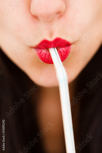 Straw and sexy lips photo