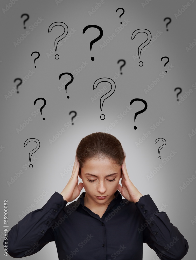 Business woman thinking hard with many questions above head on g Business woman thinking hard with many questions above head on g