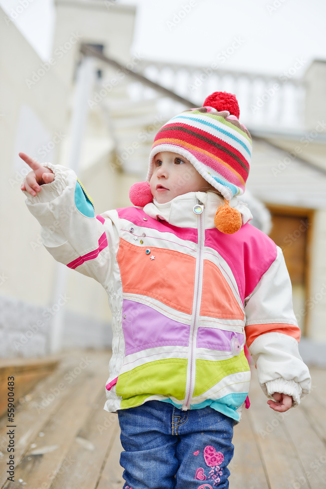 Obraz premium toddler girl point with finger