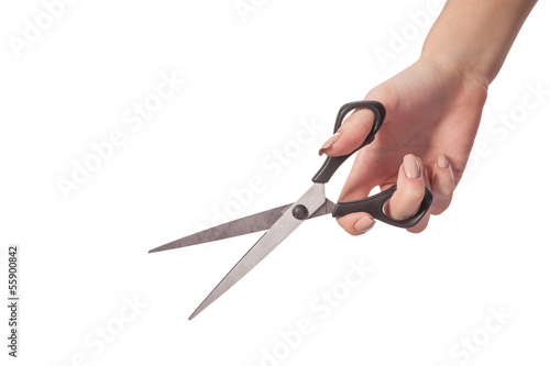 фотографія Hand is holding scissors isolated