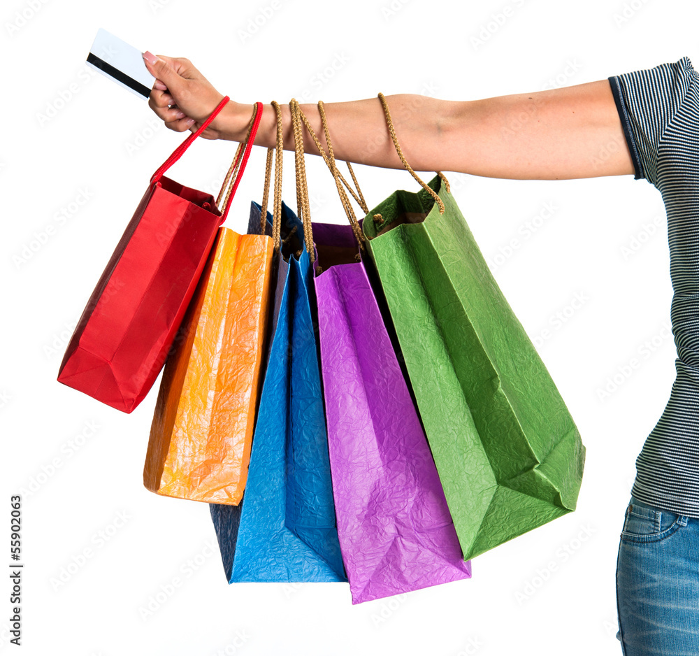 Woman's hand holding shopping bags