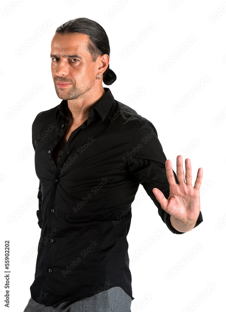 Portrait of young man doing stop symbol Portrait of young man doing stop symbol