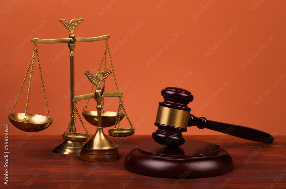 judge gavel and scales of justice on table judge gavel and scales of justice on table