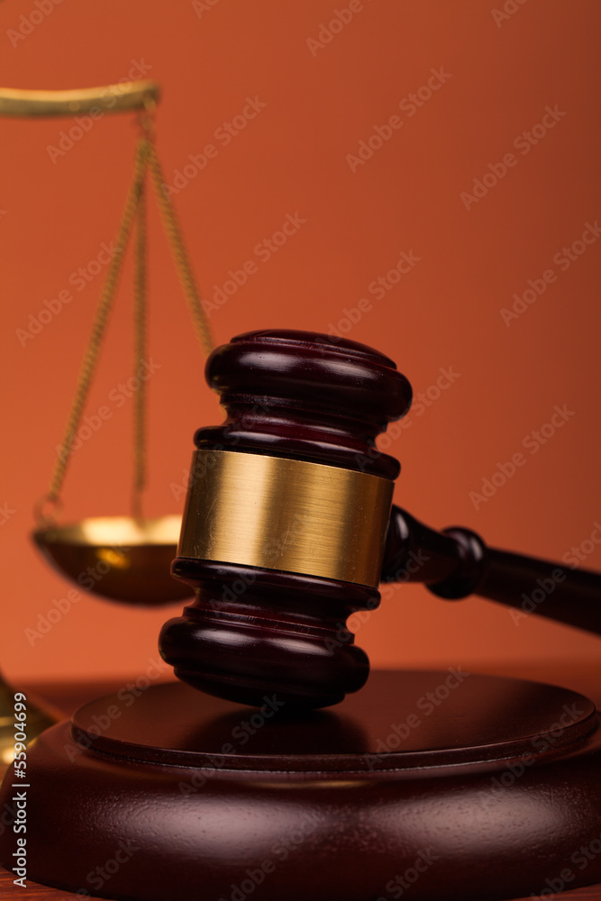 judge gavel and scales of justice on table judge gavel and scales of justice on table